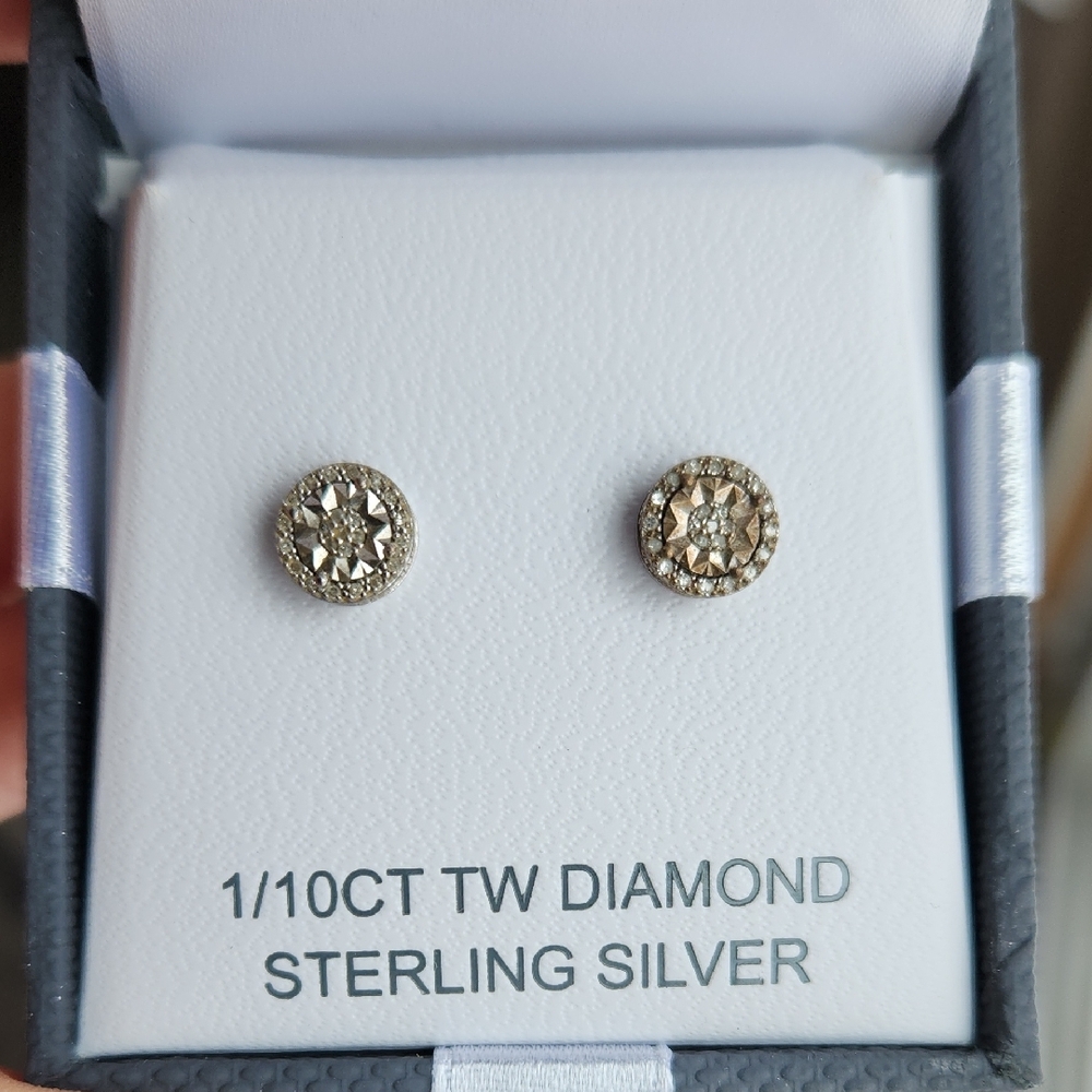 Silver Round Stud Earrings with Textured Surface and Diamond Accents